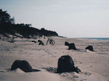 Scenic view of beach against clear sky