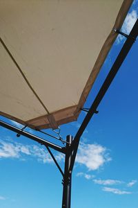 Low angle view of cables against sky