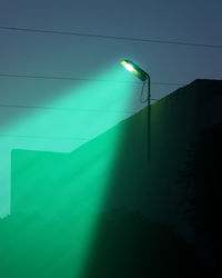 Low angle view of illuminated street light