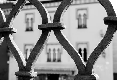 Close-up of chain hanging on bridge