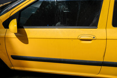 Close-up of yellow car window