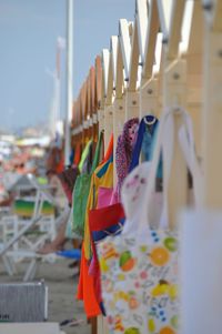 Close-up of multi colored clothespins hanging on clothesline