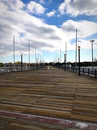 Walkway against sky