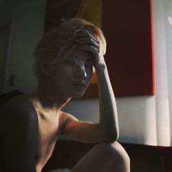 Woman sitting at home