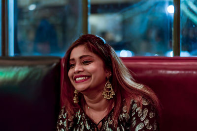 Portrait of smiling young woman