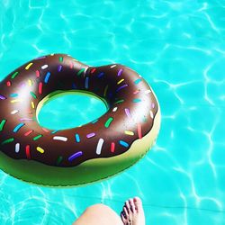 Low section of woman in swimming pool