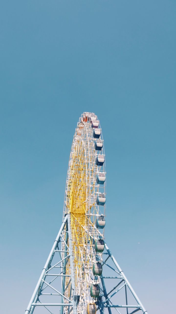 LOW ANGLE VIEW OF FERRIS WHEEL AGAINST SKY