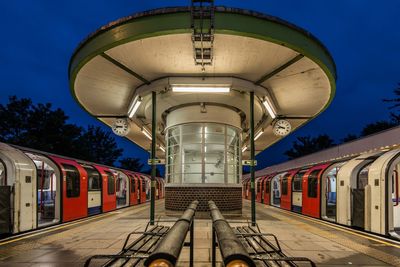 Two trains parked at train station