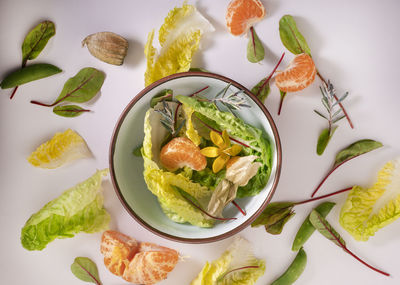 High angle view of fruits in plate on table