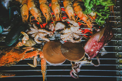 High angle view of crab on barbecue grill