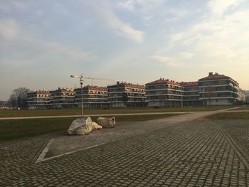 Built structure against cloudy sky