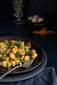 Close-up of gnocchi in plate on table
