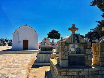 View of temple against clear blue sky