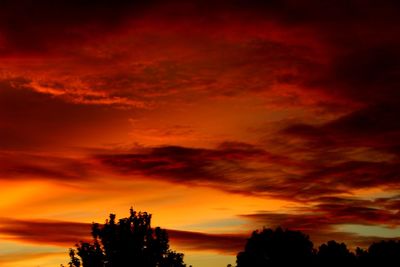 Low angle view of dramatic sky during sunset