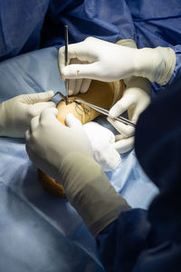 Midsection of doctor giving medicine