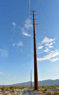 Electrical power poles and lines in mojave desert town pahrump, nevada, usa