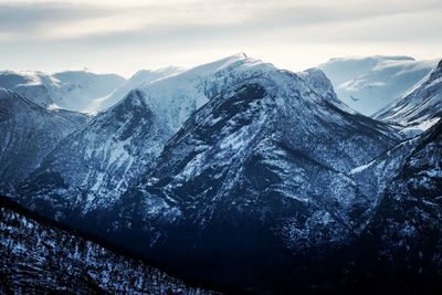 Rocky mountains against clouds