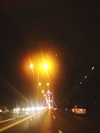 Cars moving on road at night