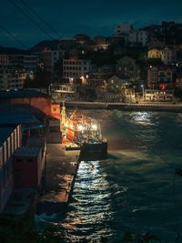 High angle view of illuminated city at night