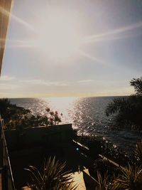 High angle view of swimming pool by sea against sky