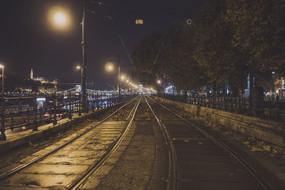 Tramway on street at night