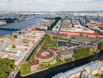 Aerial view of new holland island flooded with sunlight. place for recreation in st petersburg.