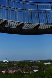 Low angle view of buildings against blue sky