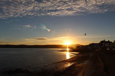 Scenic view of calm sea at sunset