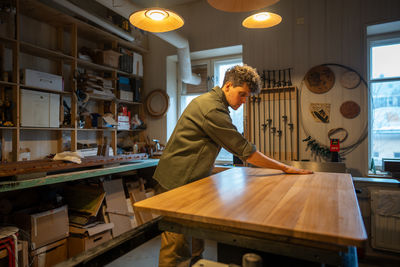 Portrait of businessman working at table