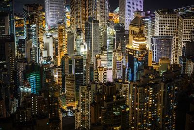 Aerial view of illuminated city at night