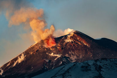 View of volcanic mountain against sky