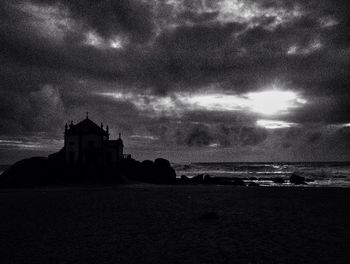 View of trees against sky at night