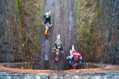 High angle view of people riding motorcycles