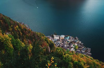 High angle view of town by sea