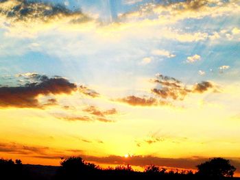 Scenic view of dramatic sky during sunset