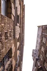 Low angle view of buildings against clear sky