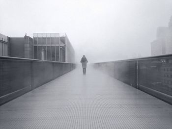 Full length of woman standing in city