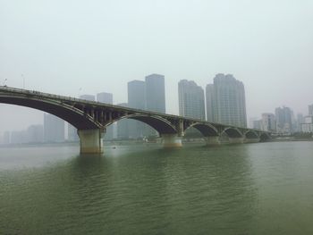 Bridge over river in city