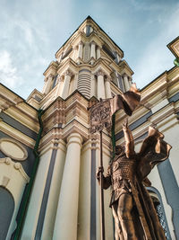 Low angle view of statue against sky