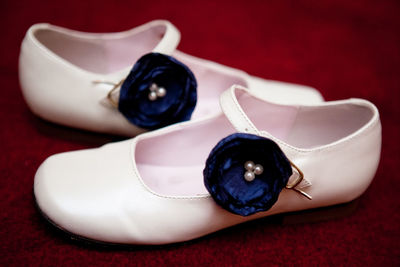 Close-up of shoes on table