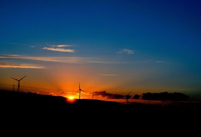 Silhouette of landscape against sky during sunset