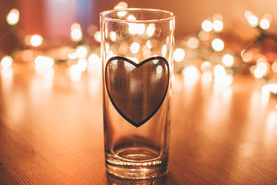 Close-up of wineglass on table
