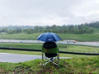 Tent on field against sky