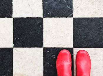 Close up of rubber boots on floor