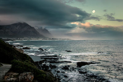 Scenic view of sea against cloudy sky