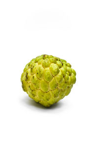 Close-up of strawberry over white background