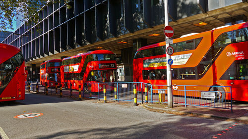 View of red road against buildings