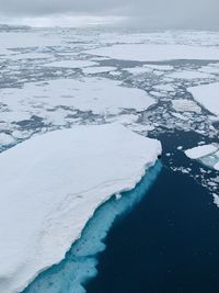 Aerial view of snow covered landscape