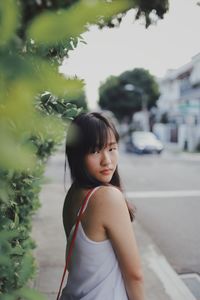 Portrait of a girl standing outdoors