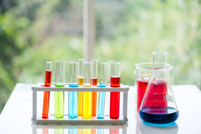 Multi colored scientific equipment on table